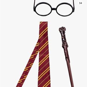 Brand new - Harry Potter Tie, Glasses and Wand. Still in packaging